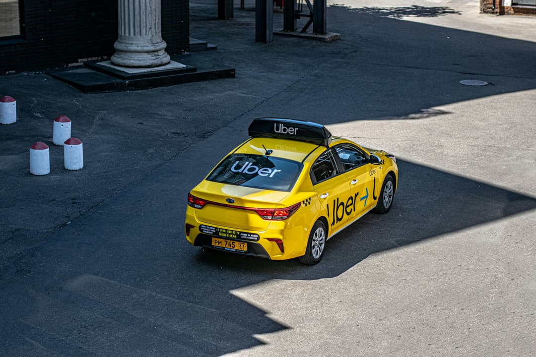 free-photo-of-yellow-uber-taxi-on-urban-street